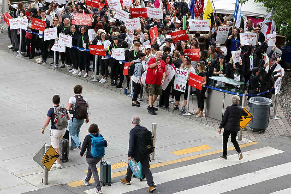 Striking Air Canada flight attendants defy back-to-work order
